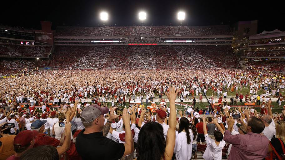 Arkansas Razorbacks fans run onto the field after the game against the Texas Longhorns