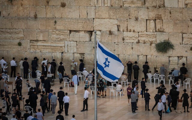 Jewish worshippers and visitors gather at the Western Wall in Jerusalem a day before the eve of Tisha B’Av, July 21, 2026. (Chaim Goldberg/Flash90)