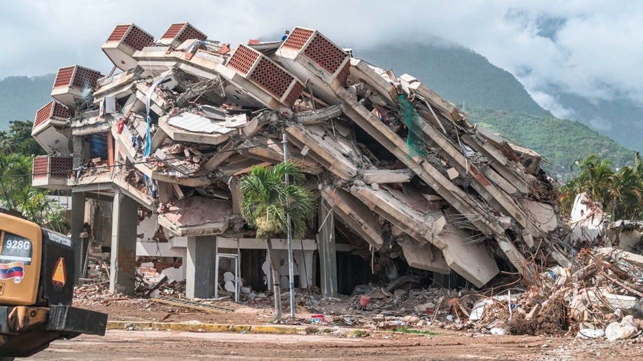 Collapsed apartment building after Venezuela earthquake