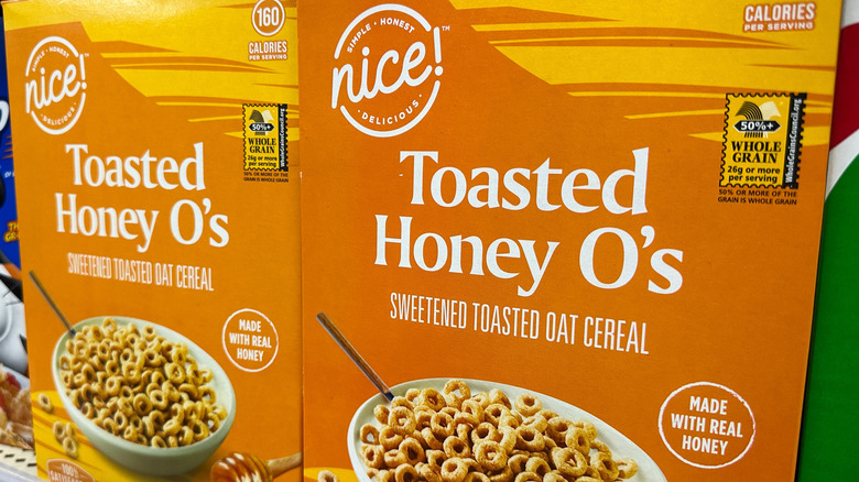 Close-up of Walgreens Nice! brand boxes of Toasted Honey O's