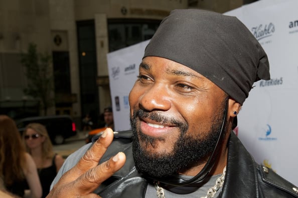 CHICAGO, IL - AUGUST 04: Malcolm-Jamal Warner attends Kiehl's LifeRide For amfAR Co-hosted By FIJI Water at Kiehl's Chicago Stores on August 4, 2014 in Chicago, Illinois. (Photo by Jeff Schear/Getty Images for FIJI Water)