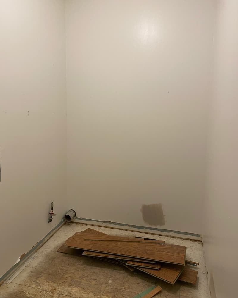 Empty room before laundry renovation.