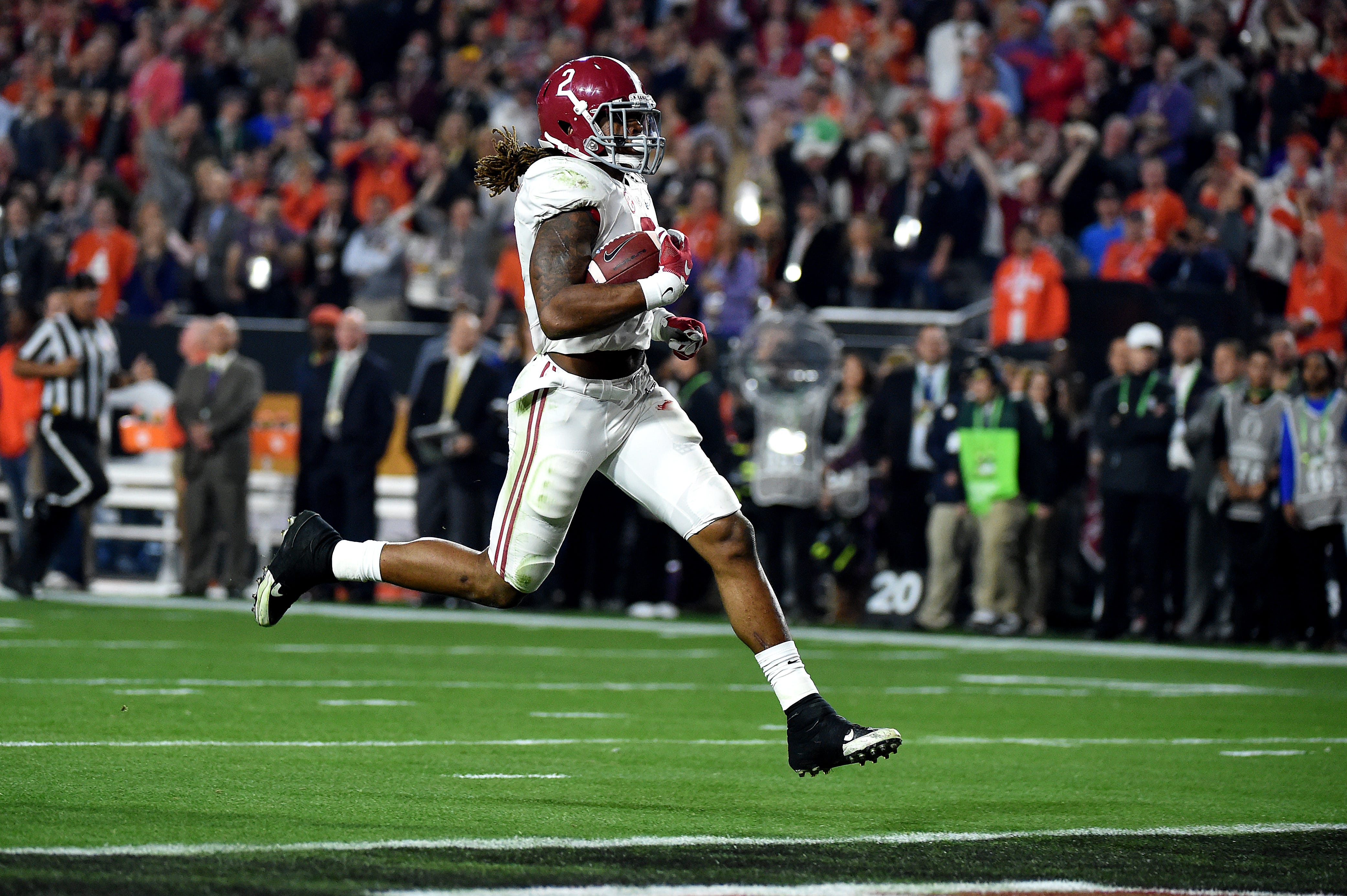 Jan 11, 2016; Glendale, AZ, USA; Alabama Crimson Tide running back Derrick Henry (2) runs for a 50 yard touchdown during the first quarter against the Clemson Tigers in the 2016 CFP National Championship at University of Phoenix Stadium. Kirby Lee-USA TODAY Sports