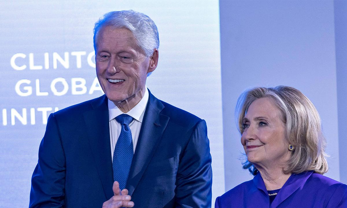 Bill Clinton trolled by critics for wearing skinny jeans and MAGA-like hat while vacationing with wife Hillary in Italy: 'A fashion don't'