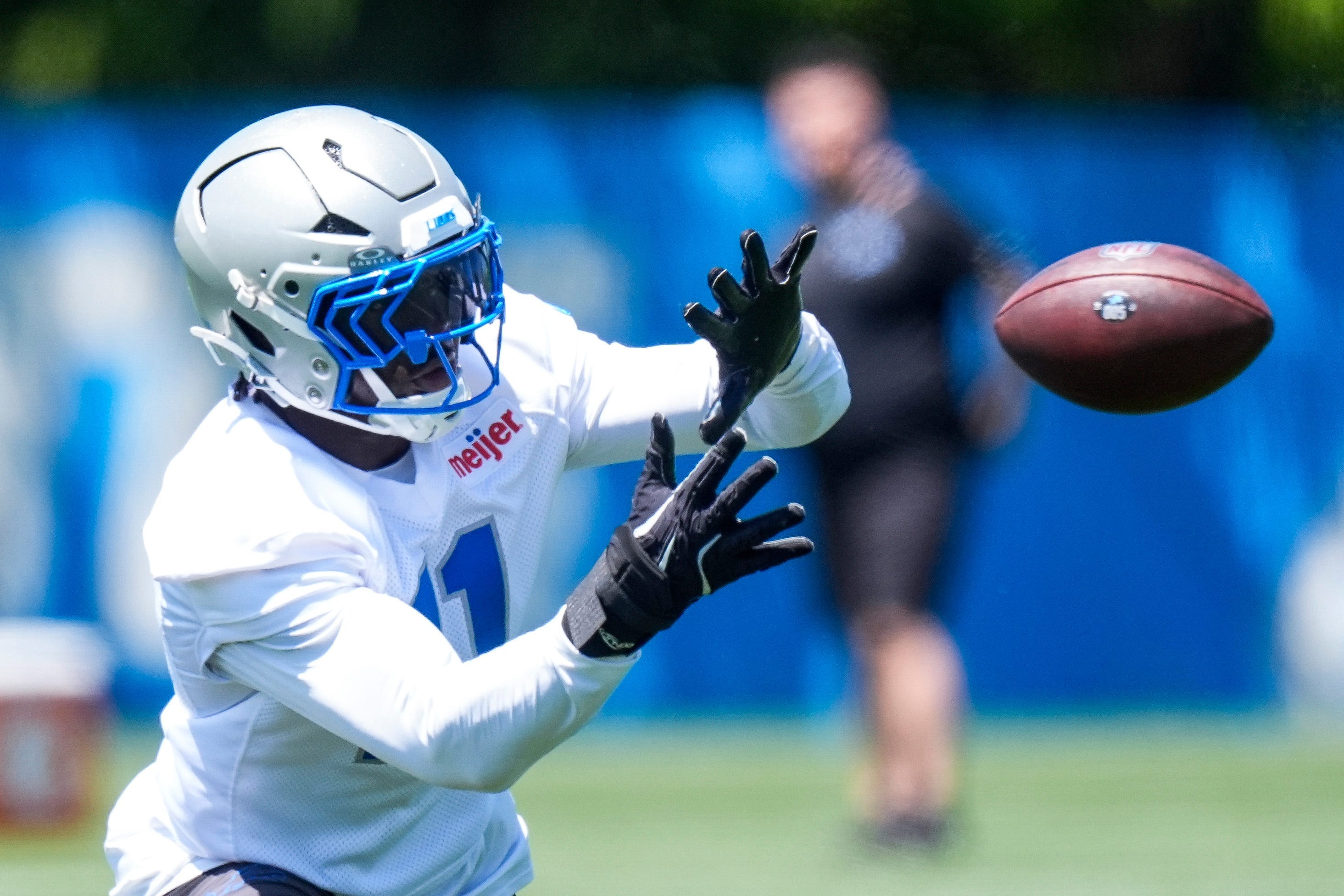 Detroit Lions linebacker Damone Clark (11) practices a drill during OTAs at Meijer Performance Center in Allen Park on Friday, May 29, 2026.