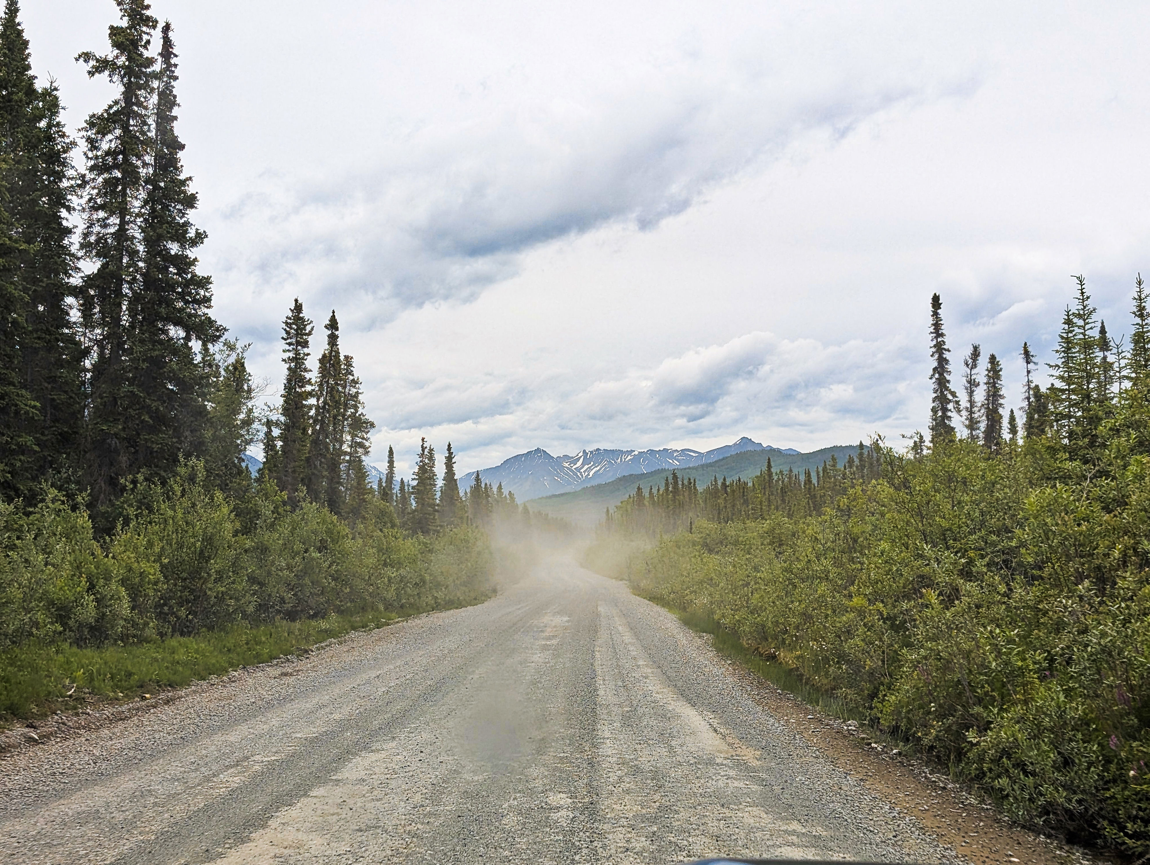 Dust cloud on 60 mile McCarthy Road to Wrangell-St Elias National Park, Alaska