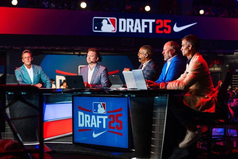 Karl Ravech, Kiley McDaniel, Eduardo Pérez, Kyle Peterson, and Chris Burke broadcast on ESPN during the first round of the 2025 MLB Draft at Coca-Cola Roxy on July 13, 2025, in Atlanta, Georgia.