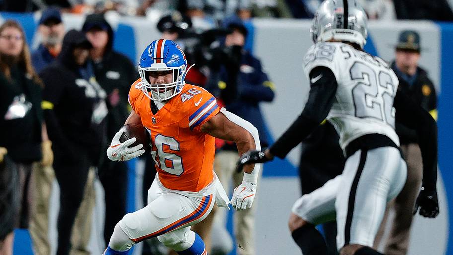 Nov 6, 2025; Denver, Colorado, USA; Denver Broncos fullback Adam Prentice (46) runs the ball against Las Vegas Raiders corner