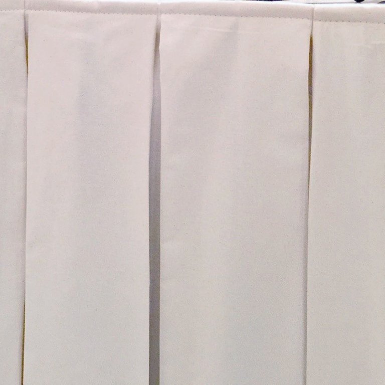 white pleated sink skirt