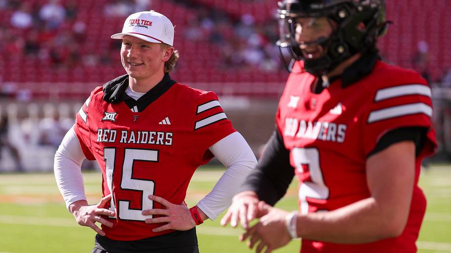 Texas Tech quarterback Will Hammond wearing a hat and his jersey during a workout
