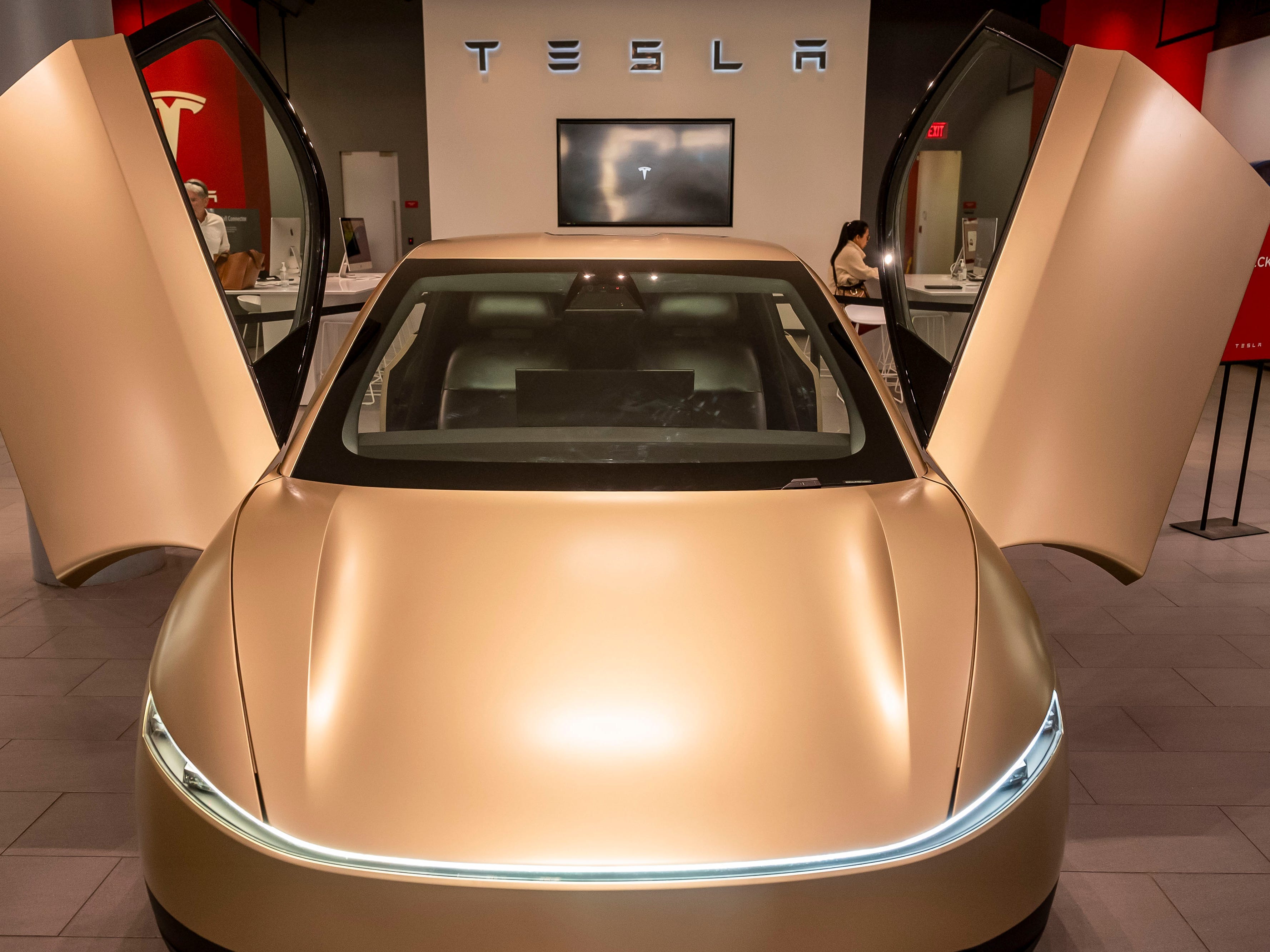 Wall Street wants answers on robotaxis and 'physical AI' as Tesla gears up for earnings