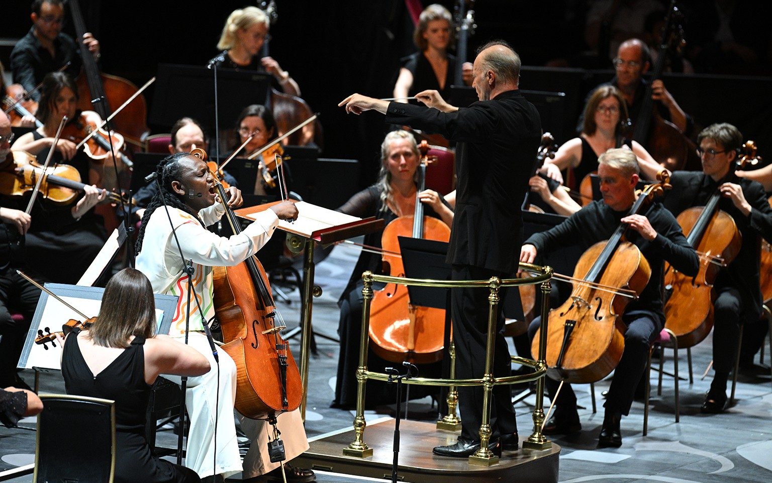 South African cellist Abel Selaocoe performing with the BBC Philharmonic Orchestra