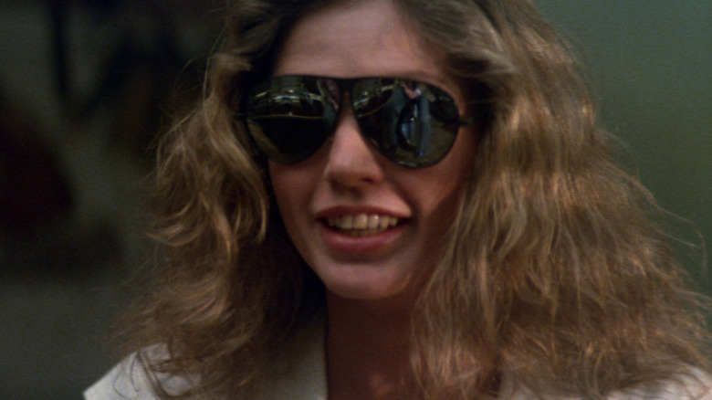 Susan Dey as Cindy Fairmont smiling and wearing sunglasses in Looker