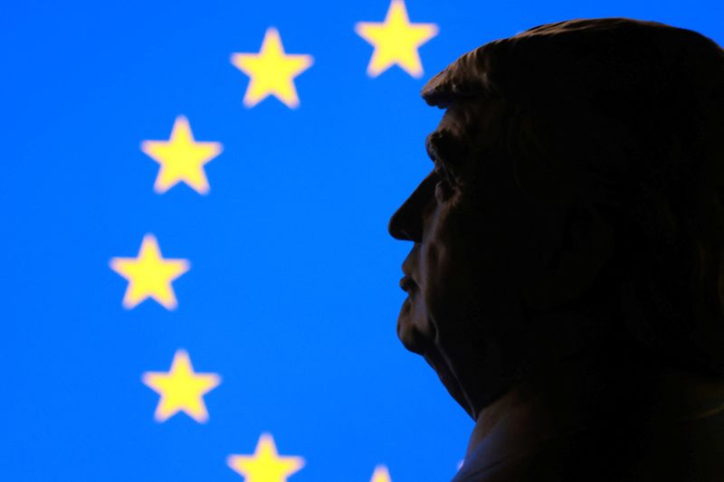 Illustration shows 3D-printed miniature model of U.S. President Donald Trump, EU flag