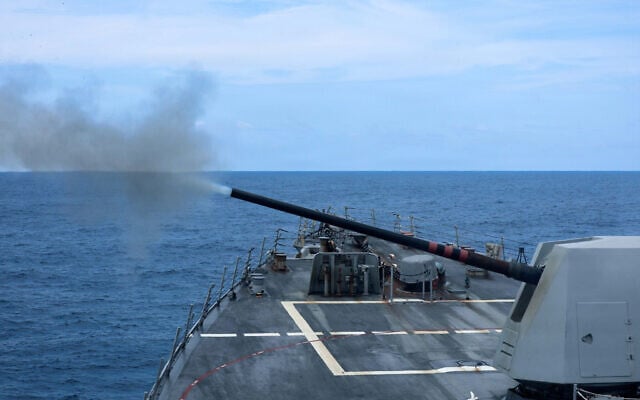 A 5-inch Mark 45 gun fires during a live-fire exercise aboard Arleigh Burke-class guided-missile destroyer USS Mason (DDG 87), deployed in the Middle East, in a photo released July 21, 2026. (US Navy photo)