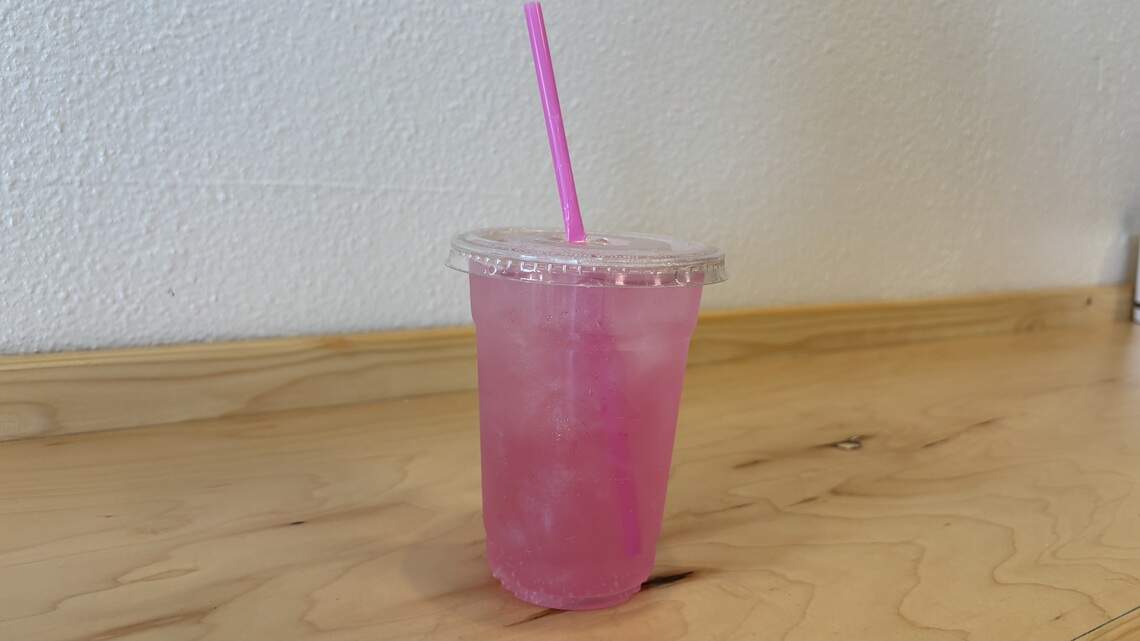 The mermaid dust lotus drink at Dot’s Spot Coffee & Treats comes with edible glitter, seen here on July 13, 2026. Dot’s Spot opened in Cayucos on Tuesday, July 14, 2026, serving Joebella Coffee and pastries from MamaBirds Bakery.