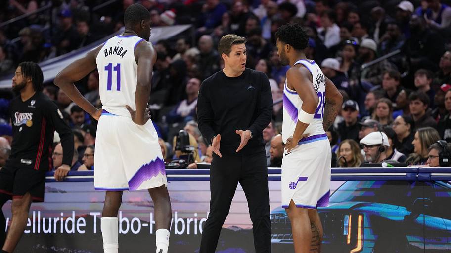 Mar 4, 2026; Philadelphia, Pennsylvania, USA; Utah Jazz head coach Will Hardy reacts with center Mo Bamba (11) and forward Br