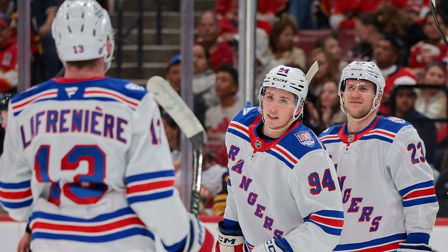 New York Rangers right wing Gabe Perreault (94) celebrates with left wing Alexis Lafreniere.