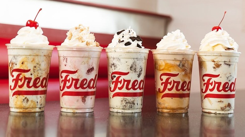 A lineup of five flavors of Freddy's frozen custard placed on a table in one of the restaurants.