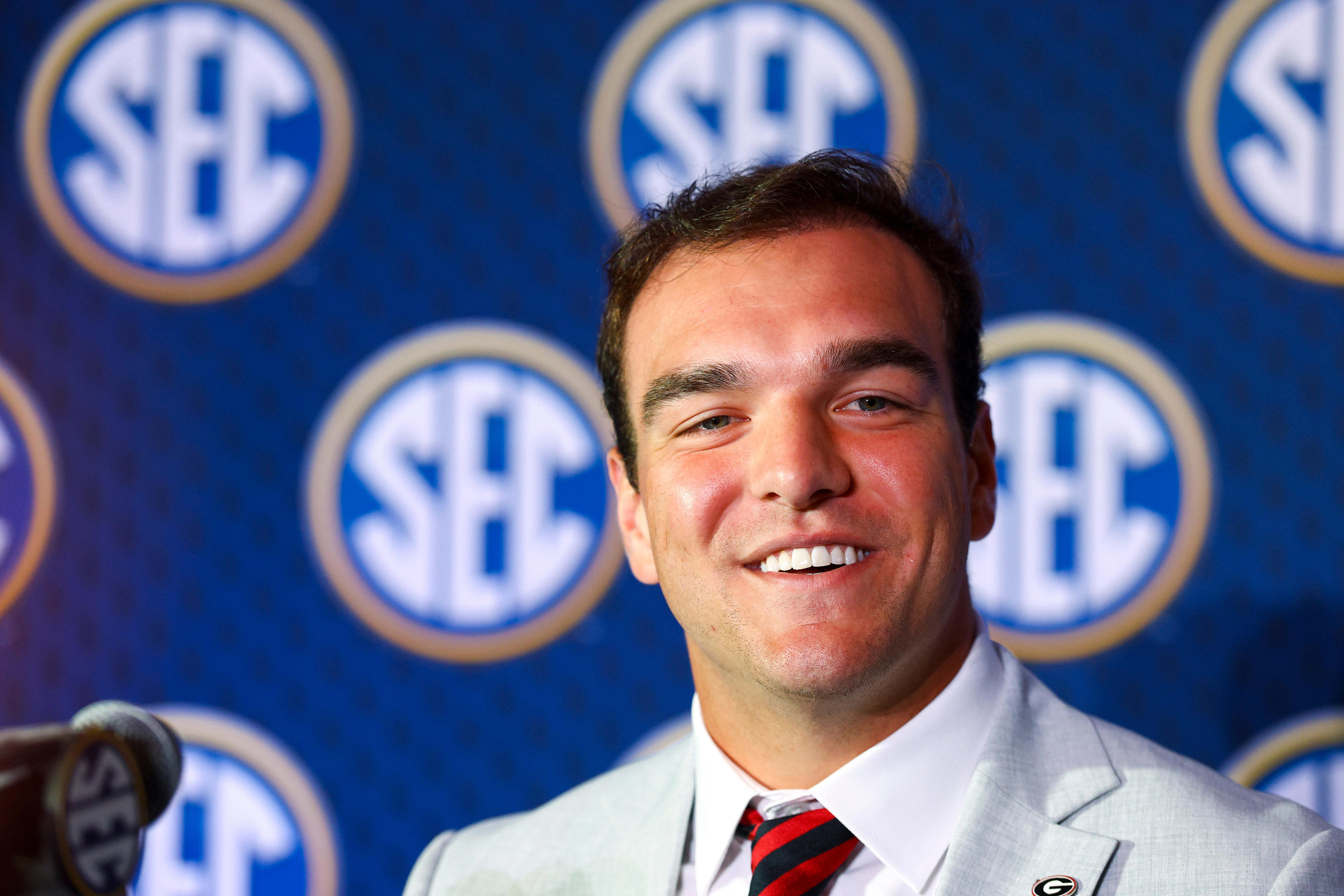 Jul 21, 2026; Tampa, FL, USA; Georgia Bulldogs quarterback Gunner Stockton (14) speaks to the press during SEC Football Kickoff Media Day at the Tampa Marriott. Mandatory Credit: Nathan Ray Seebeck-Imagn Images