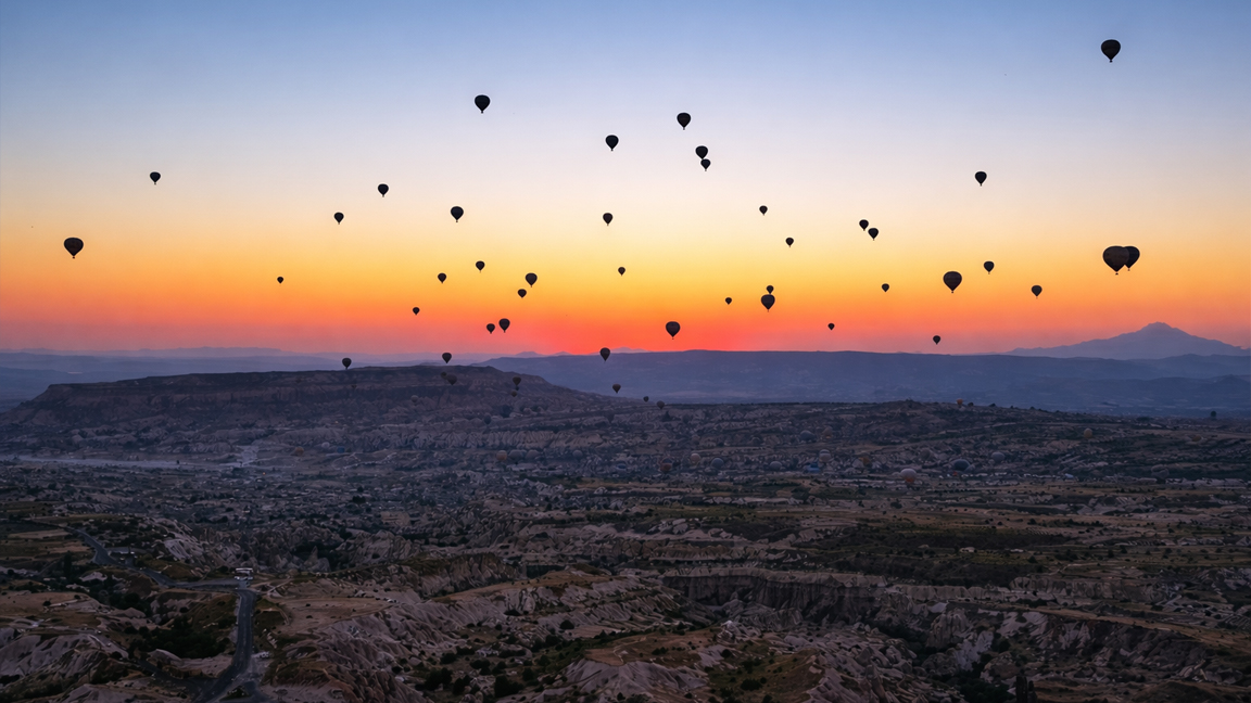 Hundreds of hot air balloons fill Cappadocia's sunrise sky