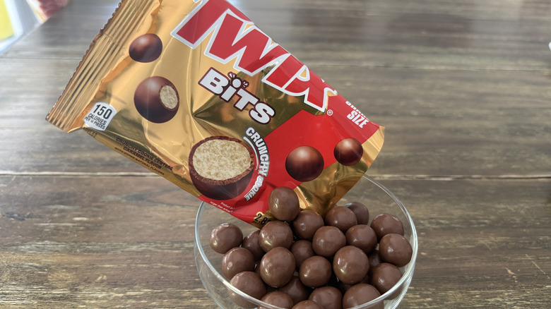 Twix Bits in glass bowl on wooden table