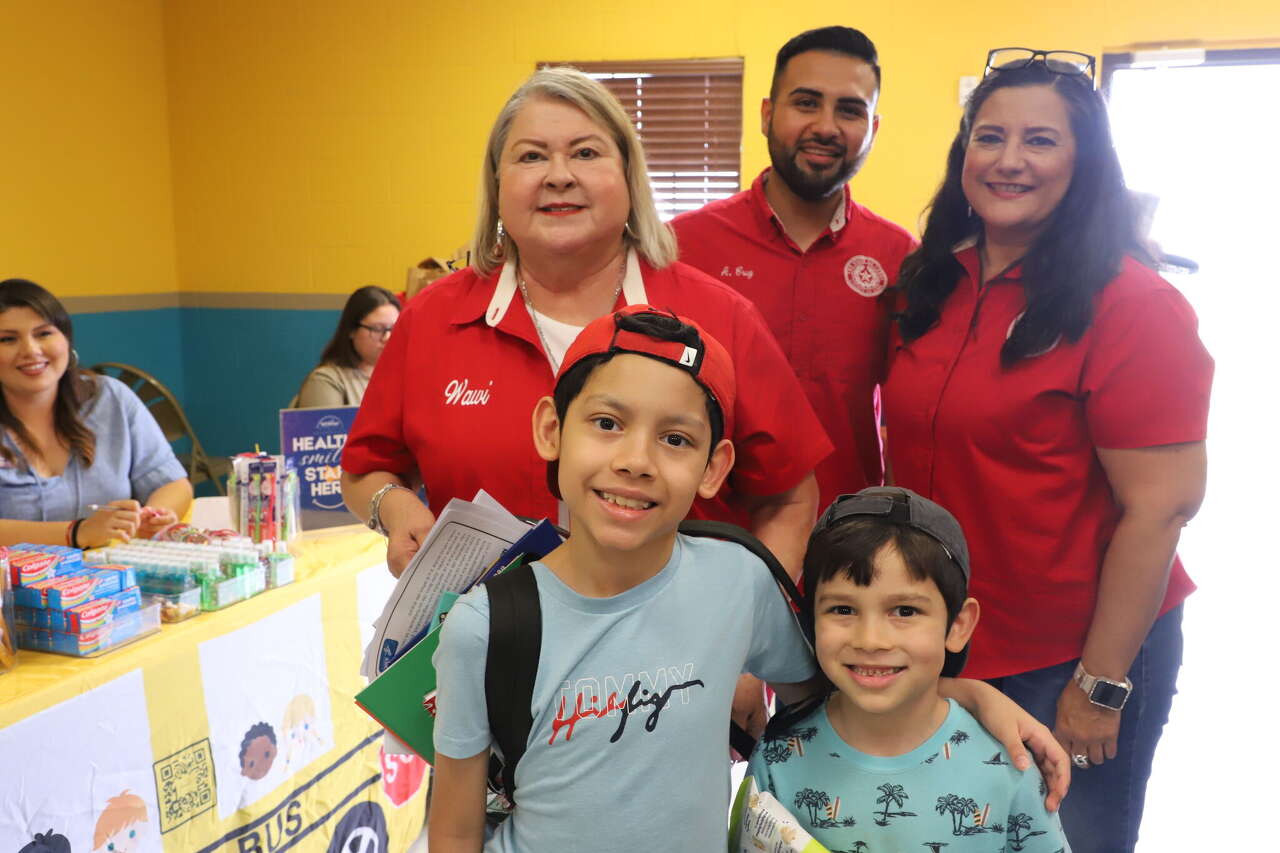 Precinct 2 students receive backpacks and school supplies