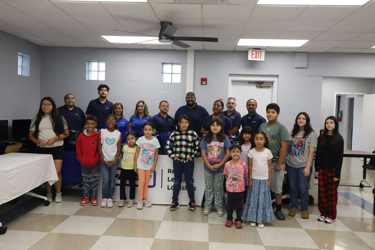 Precinct 2 students receive backpacks and school supplies