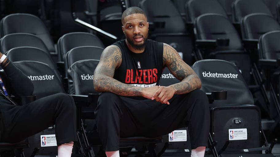Portland Trail Blazers guard Damian Lillard (0) watches his teammates during warm ups before the Trail Blazers