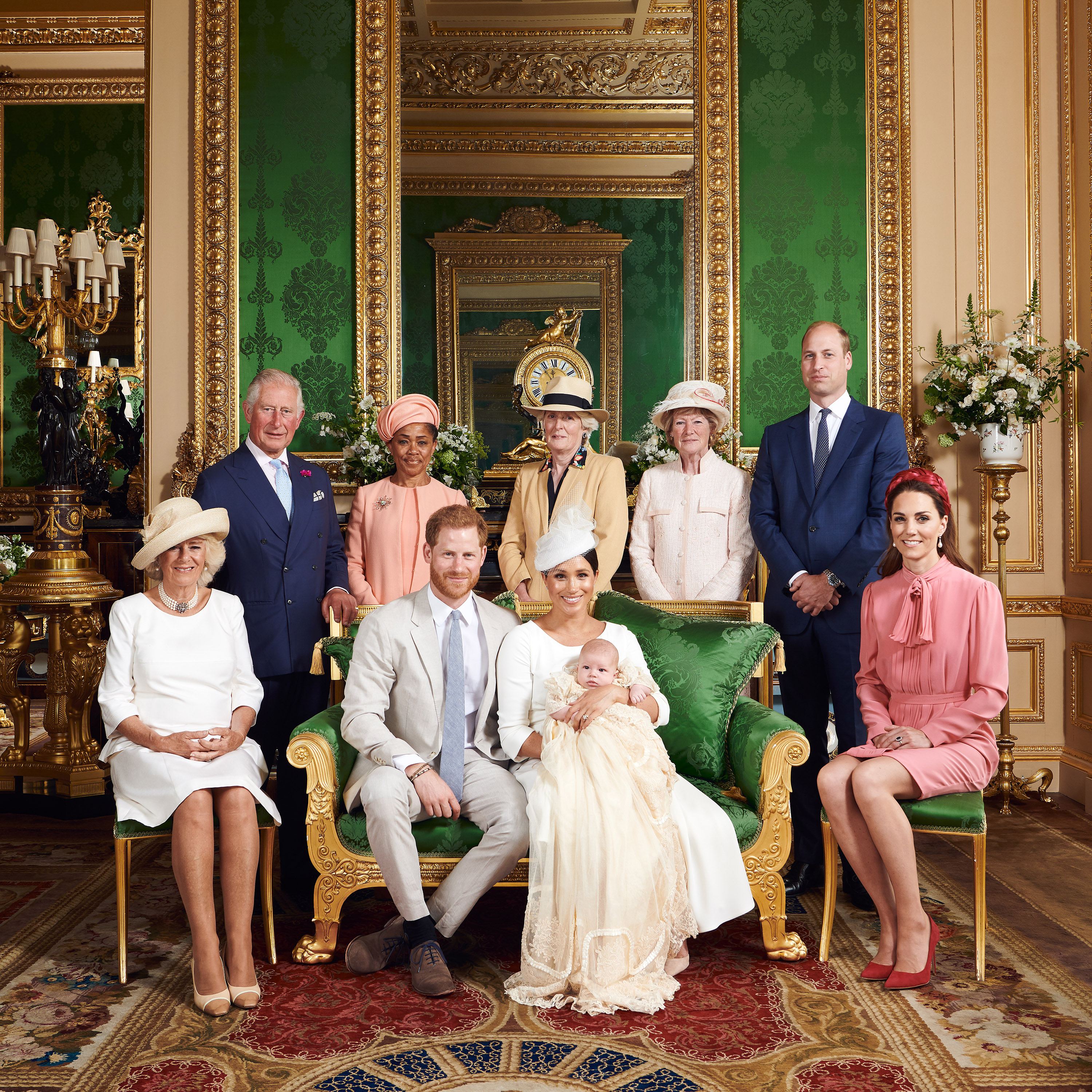 From top left: King Charles, in a navy blue suit and blue tie, Doria Ragland in a peach coat and peach hat, Lady Jane Fellowes, in a beige blazer and straw fedora with black trim, Lady Sarah McCorquodale in a pink coat and pink hat, Prince Charles in a n navy blue and blue tie, Kate Middleton in a pink dress and pink headband, Meghan Markle in a cream dress and cream hat, holding Prince Archie, in a cream christening robe, Prince Harry in a grey suit and blue tie, Queen Camilla in a white dress and cream hat.
