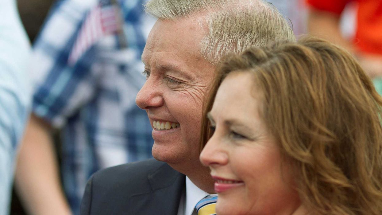 The late Senator Lindsey Graham stands with his sister Darline Graham Nordone after announcing his campaign for the 2016 GOP presidential nomination in South Carolina, June 1, 2015. REUTERS/Christopher Aluka Berry