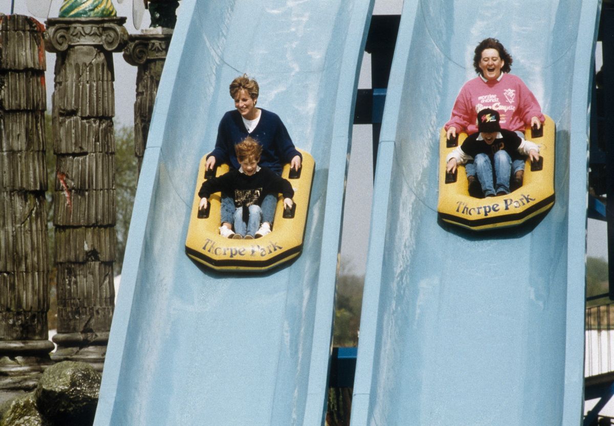 Diana, Princess of Wales, with Prince Harry and Prince William with his nanny on the Depth Charge ride at Thorpe Park, Theme Park, on April 18, 1992