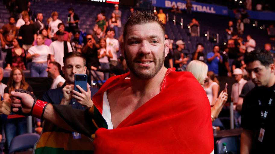 Dricus du Plessis (red gloves) celebrates defeating Kamaru Usman (blue gloves) during UFC Fight Night at Paycom Center.