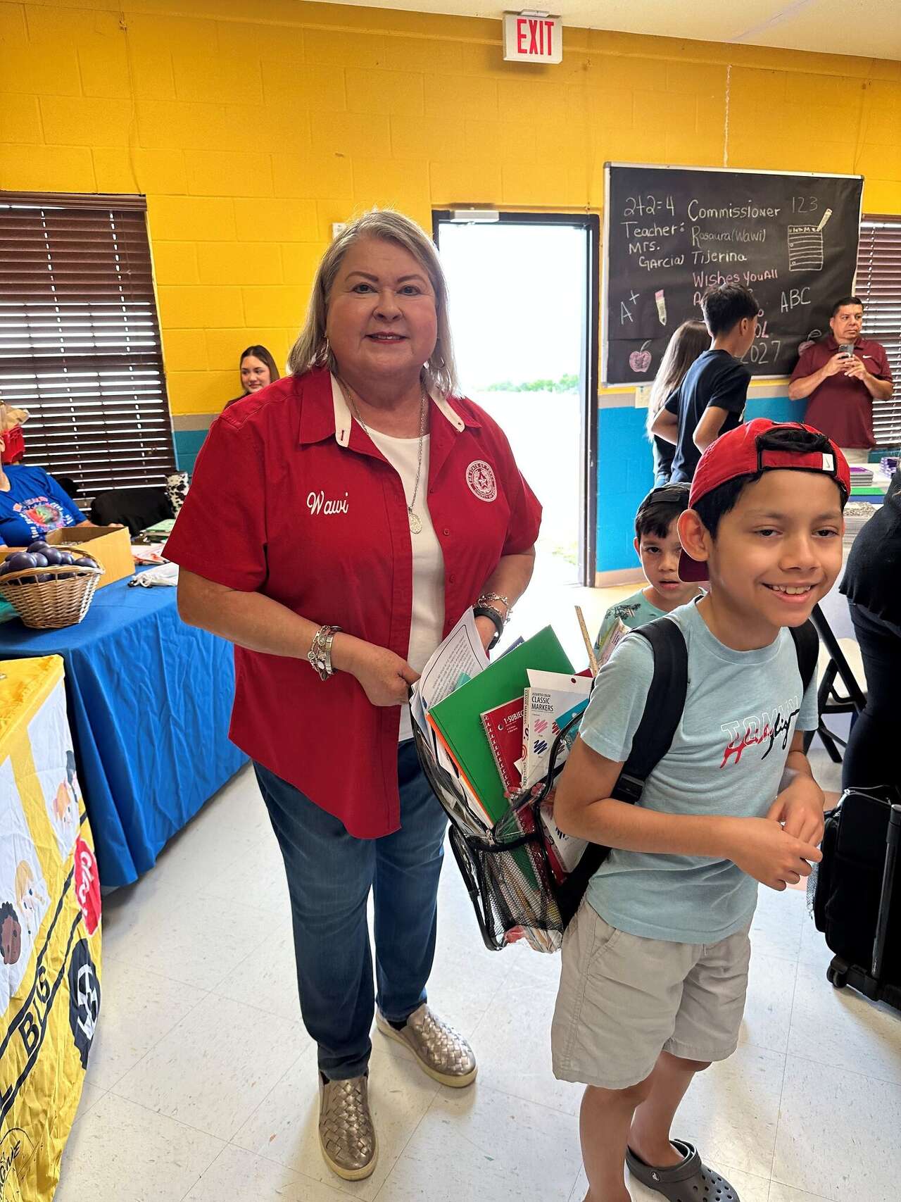 Precinct 2 students receive backpacks and school supplies