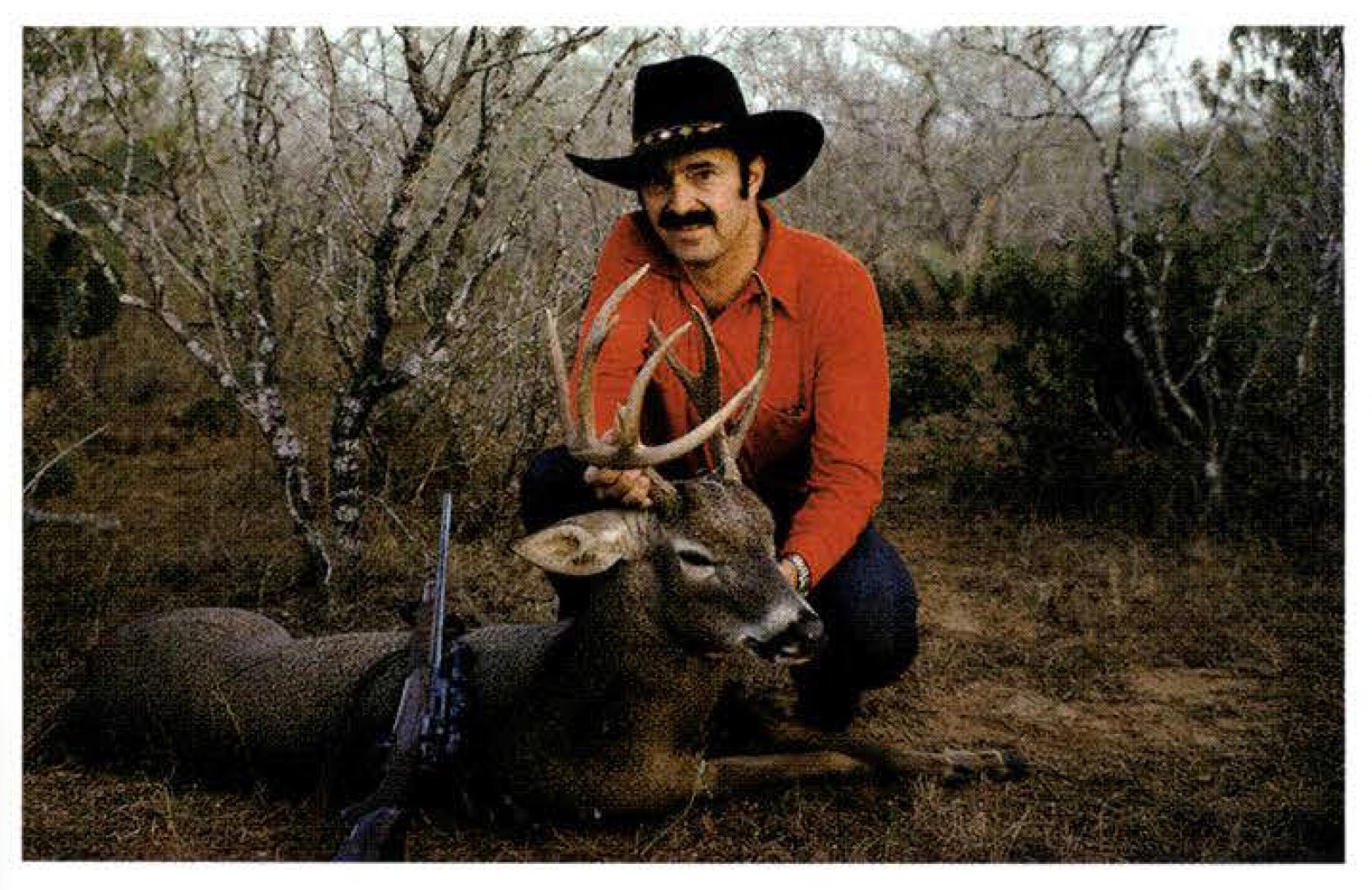 Carmichel with one of his many favorite deer rifles.