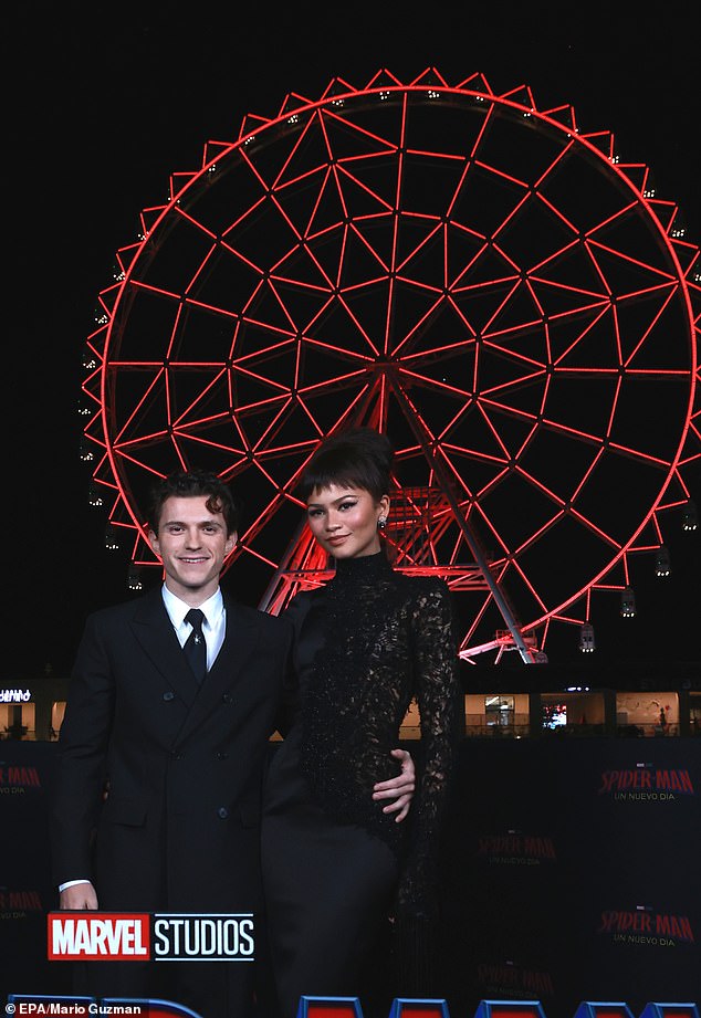 Zendaya and her husband Tom Holland struck a romantic pose in front of the 278ft tall Ferris wheel, the Aztlán 360, during a fan event in Mexico City on Monday