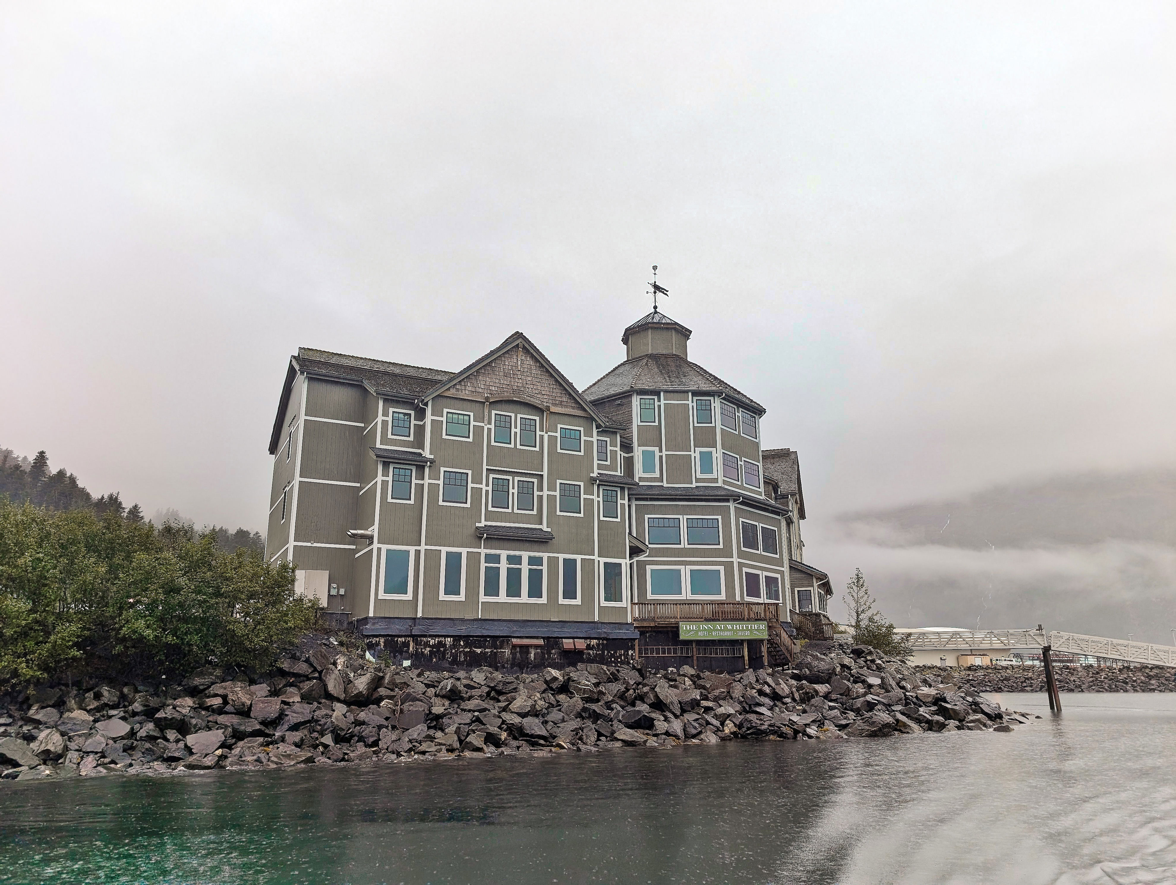 The Inn at Whittier as seen from a boat in the Whittier marina, Alaska