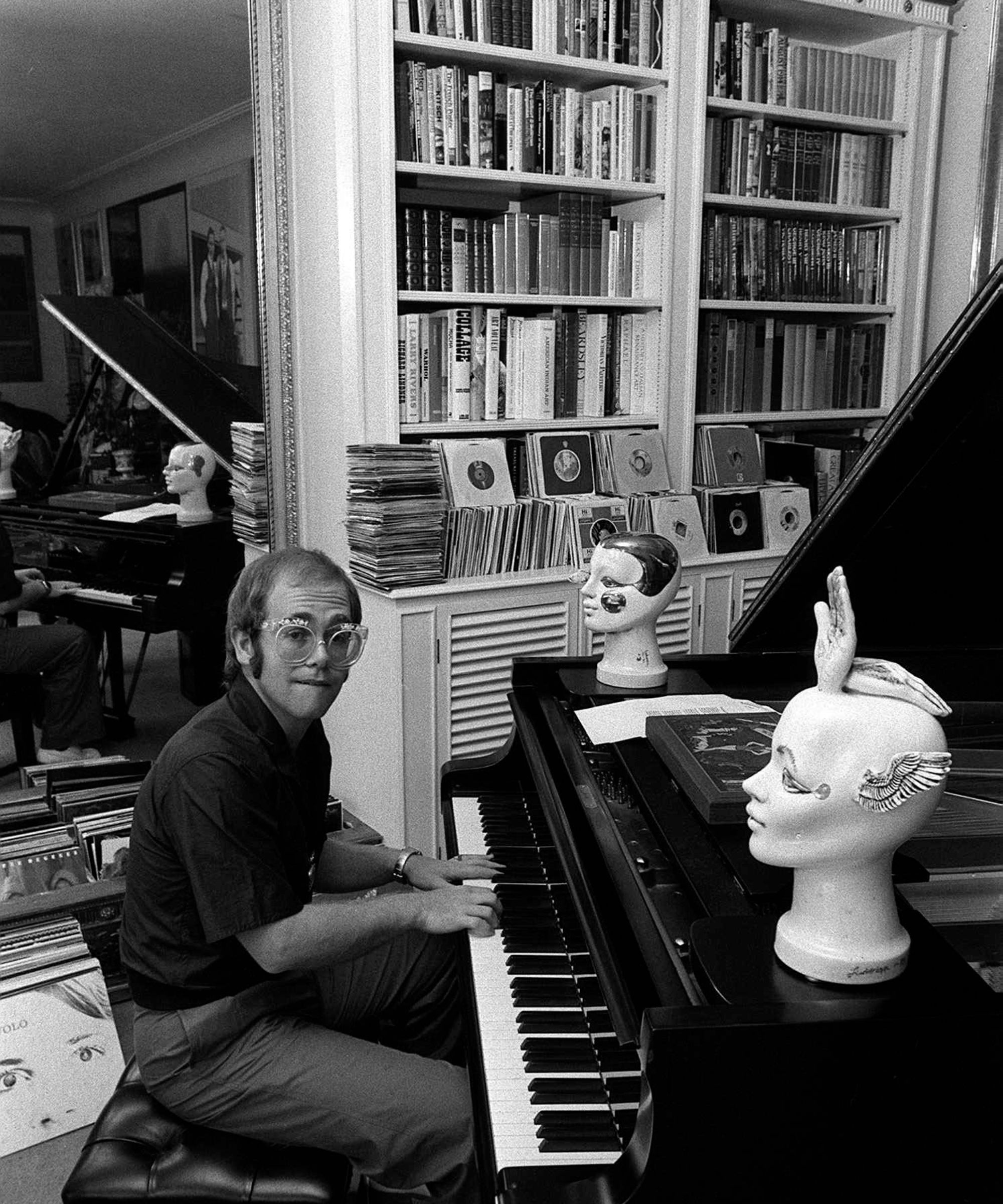 elton john at his piano