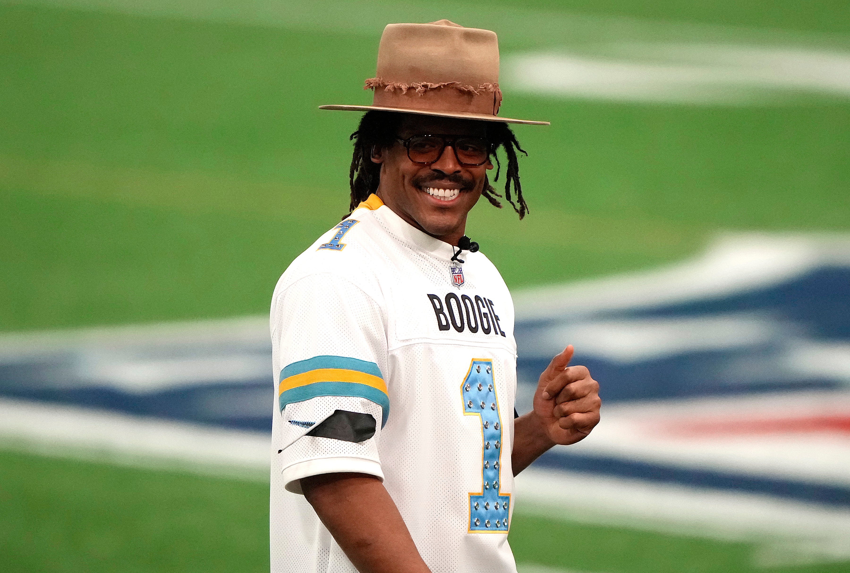Cam Newton signed an expanded contract with ESPN in August 2025, becoming one of Stephen A. Smith's primary debate partners on First Take, but was reportedly laid off Tuesday (Getty)