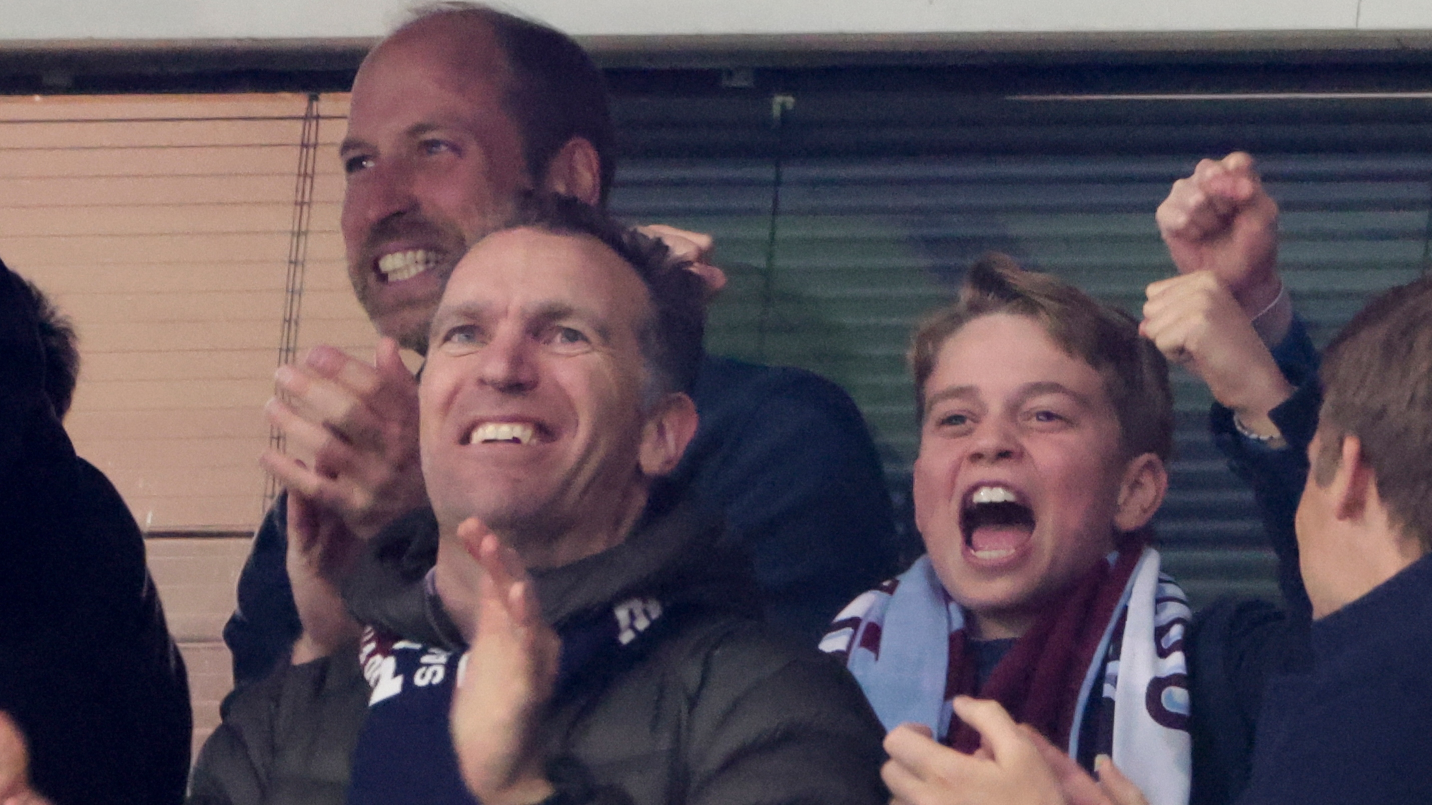 Prince William and Prince George celebrate the second goal of Aston Villa during the UEFA Champions League 2024/25 Quarter Final Second Leg football match on April 15, 2025