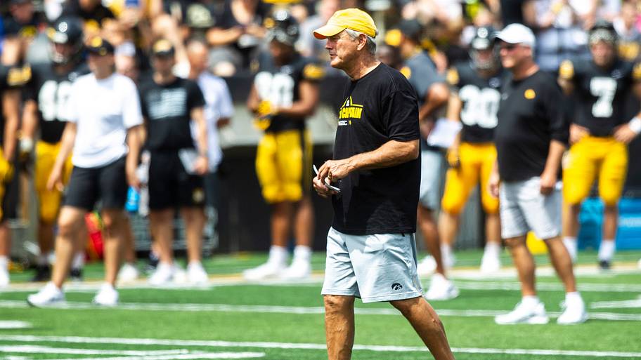 Iowa head coach Kirk Ferentz instructs players during an Aug. 2019 summer practice in Iowa City.