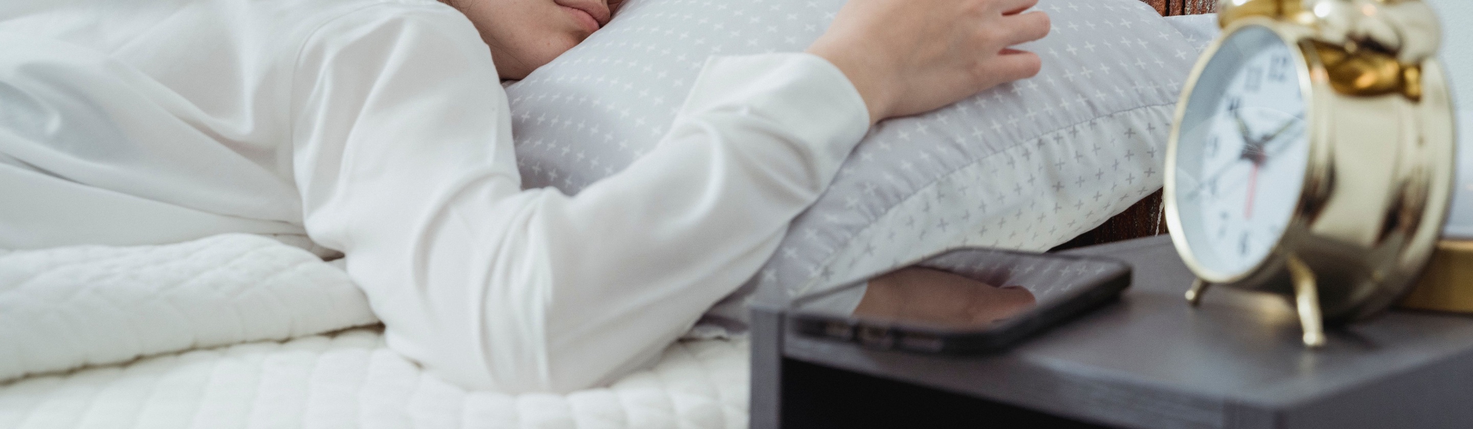 Here's Why You Shouldn't Sleep with Your Phone by Your Pillow