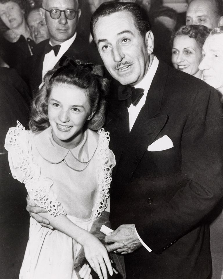 Walt Disney posing for the camera with Kathryn Beaumont, 26 July 1951