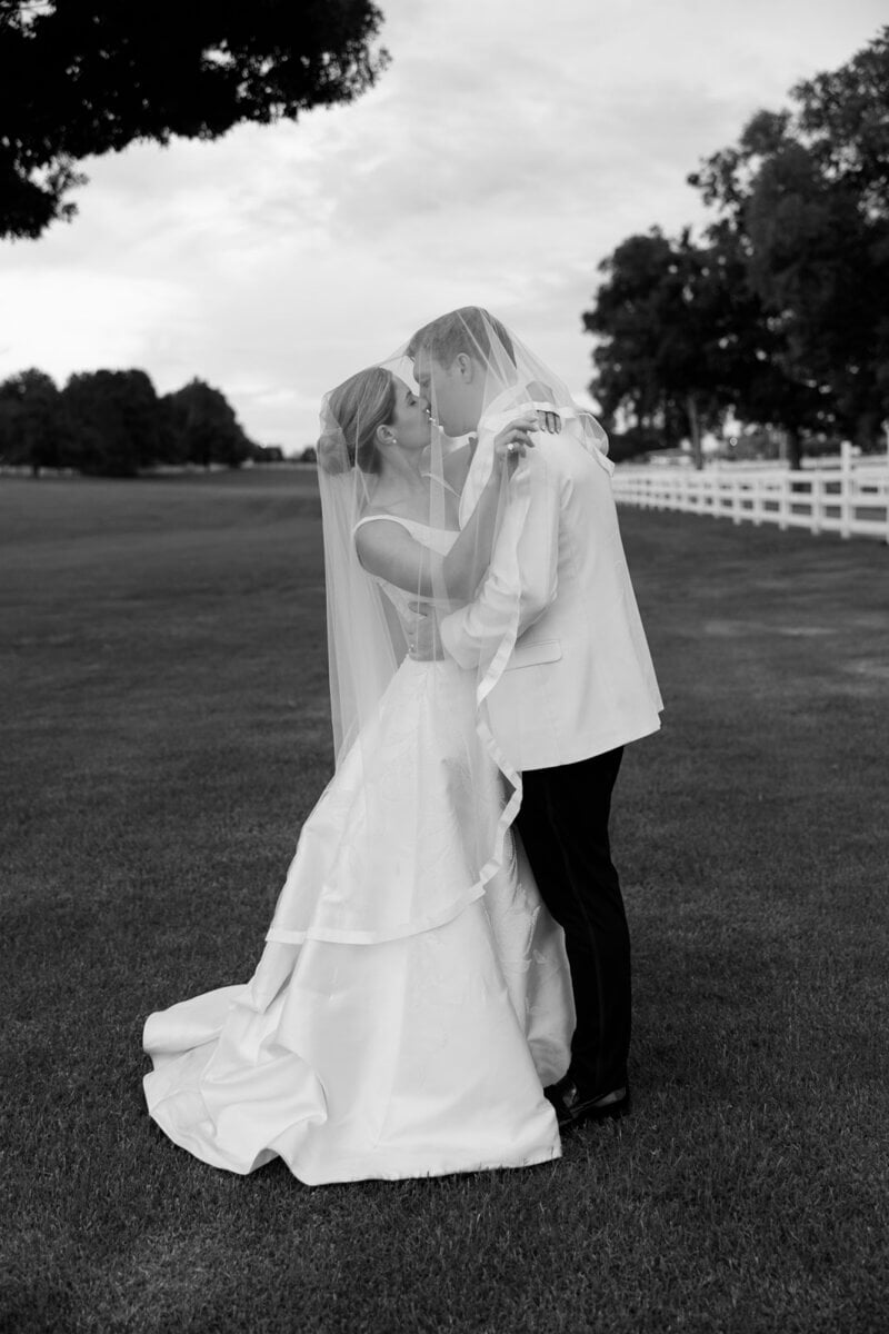 The gown’s fabric, designed by Enaura Bridal, featured a French knot design that took hundreds of hours to hand-tie.” Just the fabric itself was truly a work of art!” Claire says. Image: Rachel Fugate Photography