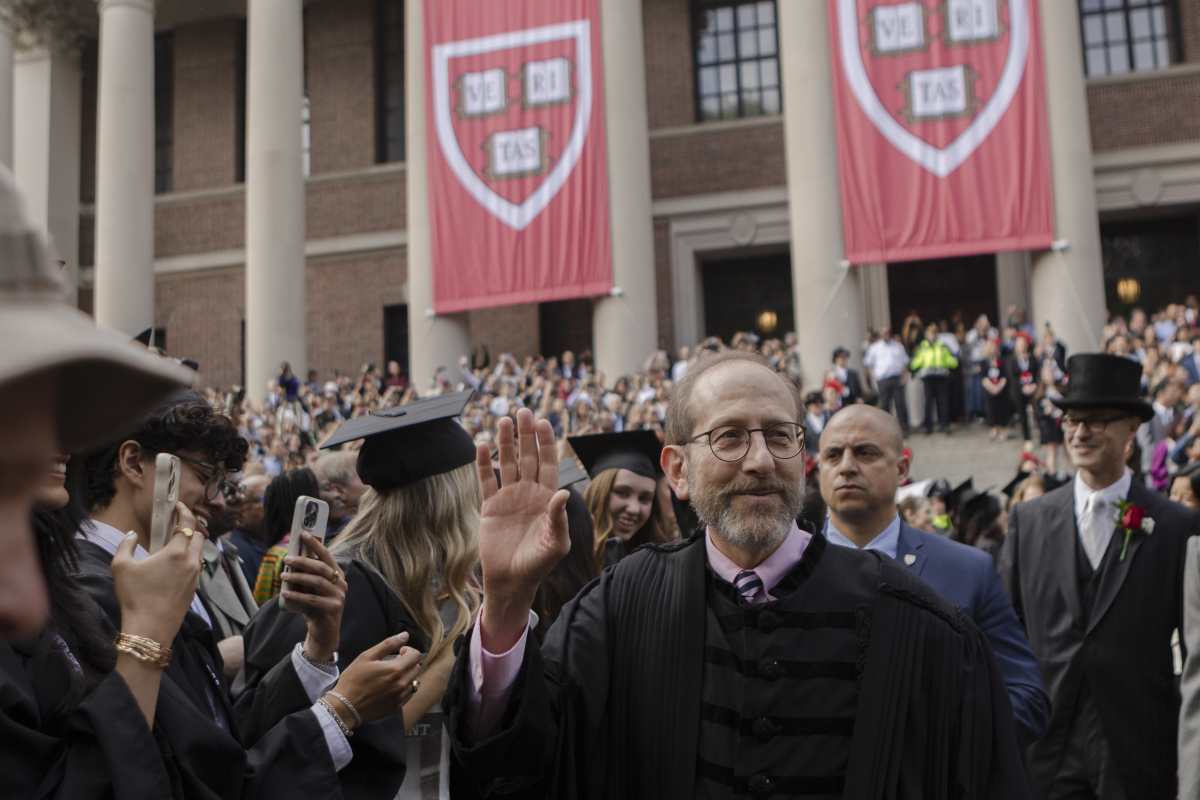 CAMBRIDGE, MASSACHUSETTS - MAY 29: Harvard President Alan Garber walks the Tercentenary Theatre processional through Harvard Yard on May 28, 2025 in Cambridge, Massachusetts. The joyous occasion unfolds amid escalating tensions between Harvard and the Trump administration, which has ordered the cancellation of federal contracts valued at approximately $100 million. (Photo by Libby O'Neill/Getty Images)