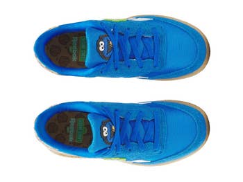 Top view of blue sneakers featuring character-themed insoles and bright design, suitable for a casual, playful style