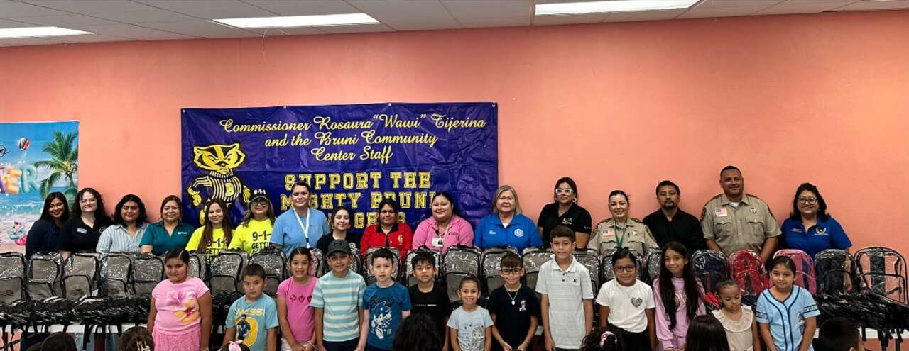 Precinct 2 students receive backpacks and school supplies
