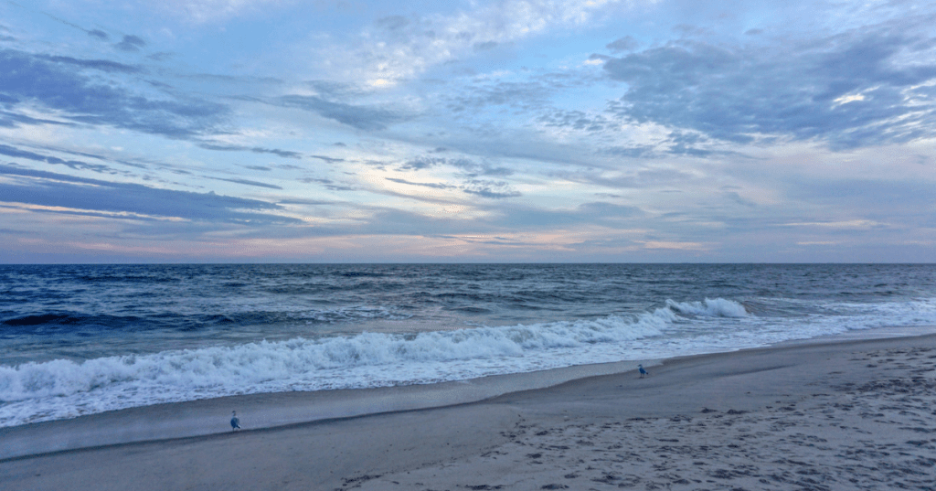 The surf off Jones Beach on Long Island as the sun goes down.
