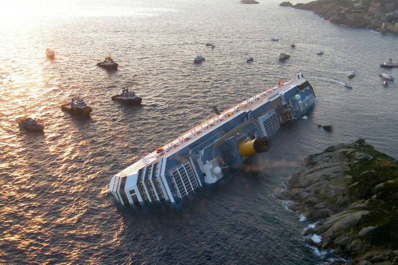 The Costa Concordia a day after the cruise ship ran aground and keeled over off the Isola del Giglio