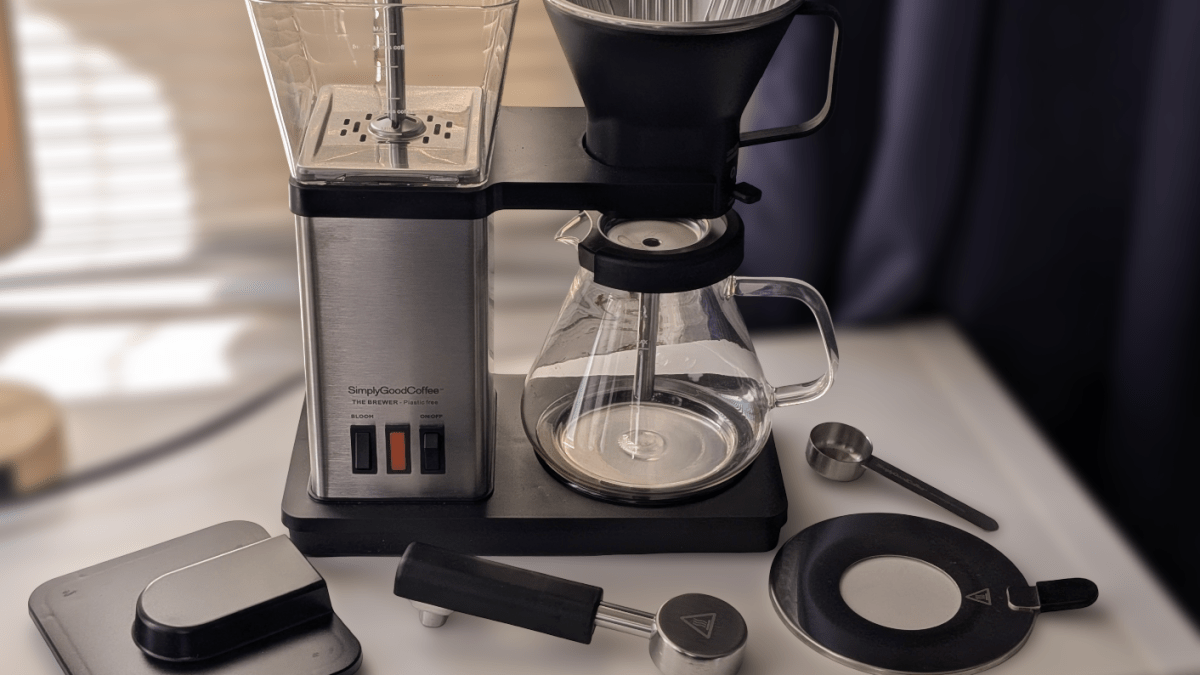the brewer with parts laid out on table